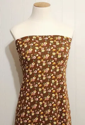 Rib Knit Fabric Brown Rib Knit Fabric with Yellow and Pink Floral Print on Ribbed Poly Spandex 4 Way Stretch Fabric. Sold by the 1/2 Yard.