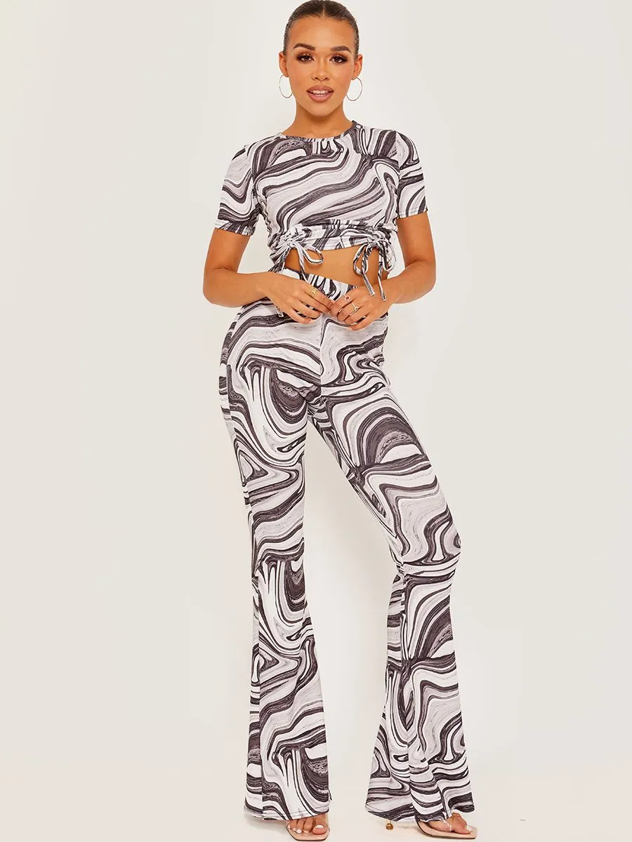 Shayla Marble Print Ribbed Flared Trousers In Grey