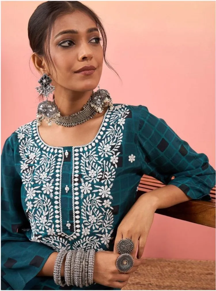 Women Embroidered Regular Thread Work Kurta with Trousers