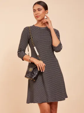Women Round Neck Black & White Printed Regular Fit Hosiery Dress